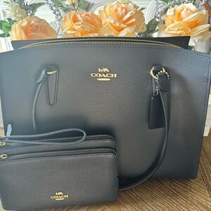 Like new Dark Blue Coach purse and matching clutch wallet.